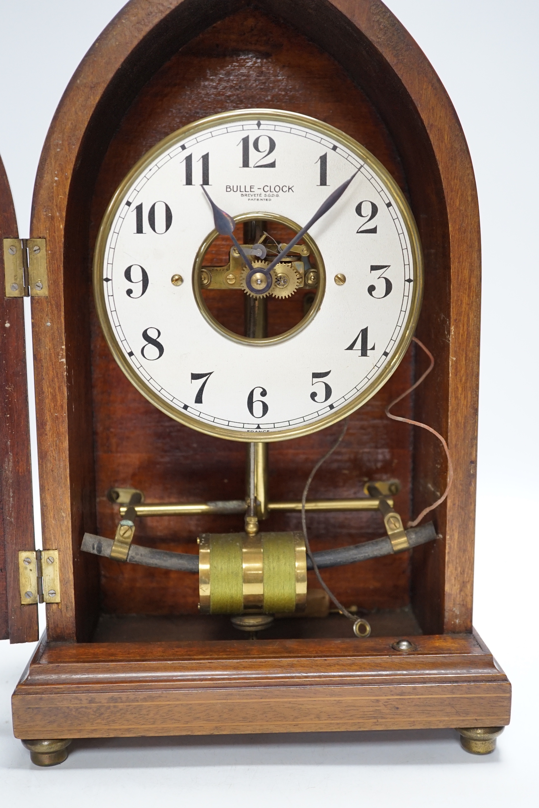 An early 20th century electro magnetic Boulle clock with inlaid case, height 36.5cm